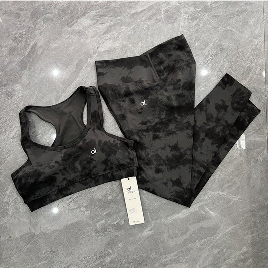 Woman wearing a tie-dye women's yoga sports bra camisole style top, elastic and tight-fitting for sports fitness wear