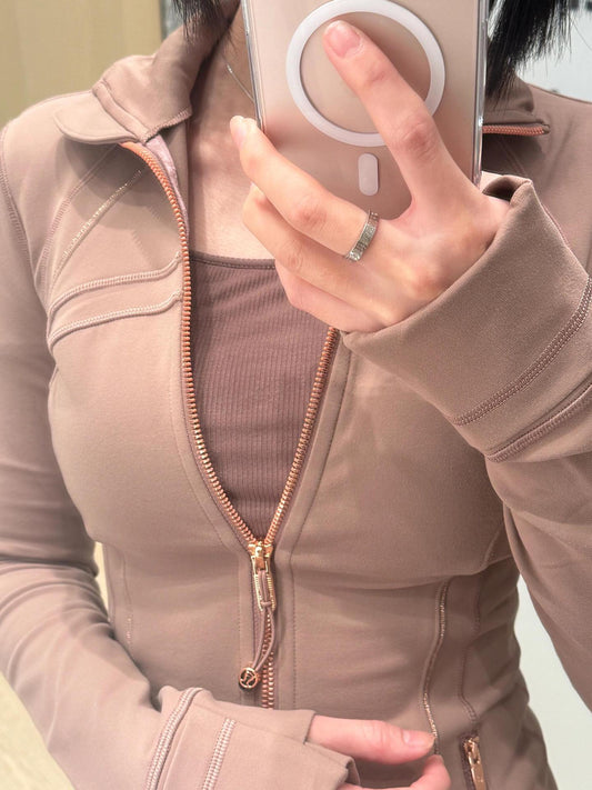 woman wearing Golden Edge Define Slim Sports Jacket in Twilight Rose during yoga session