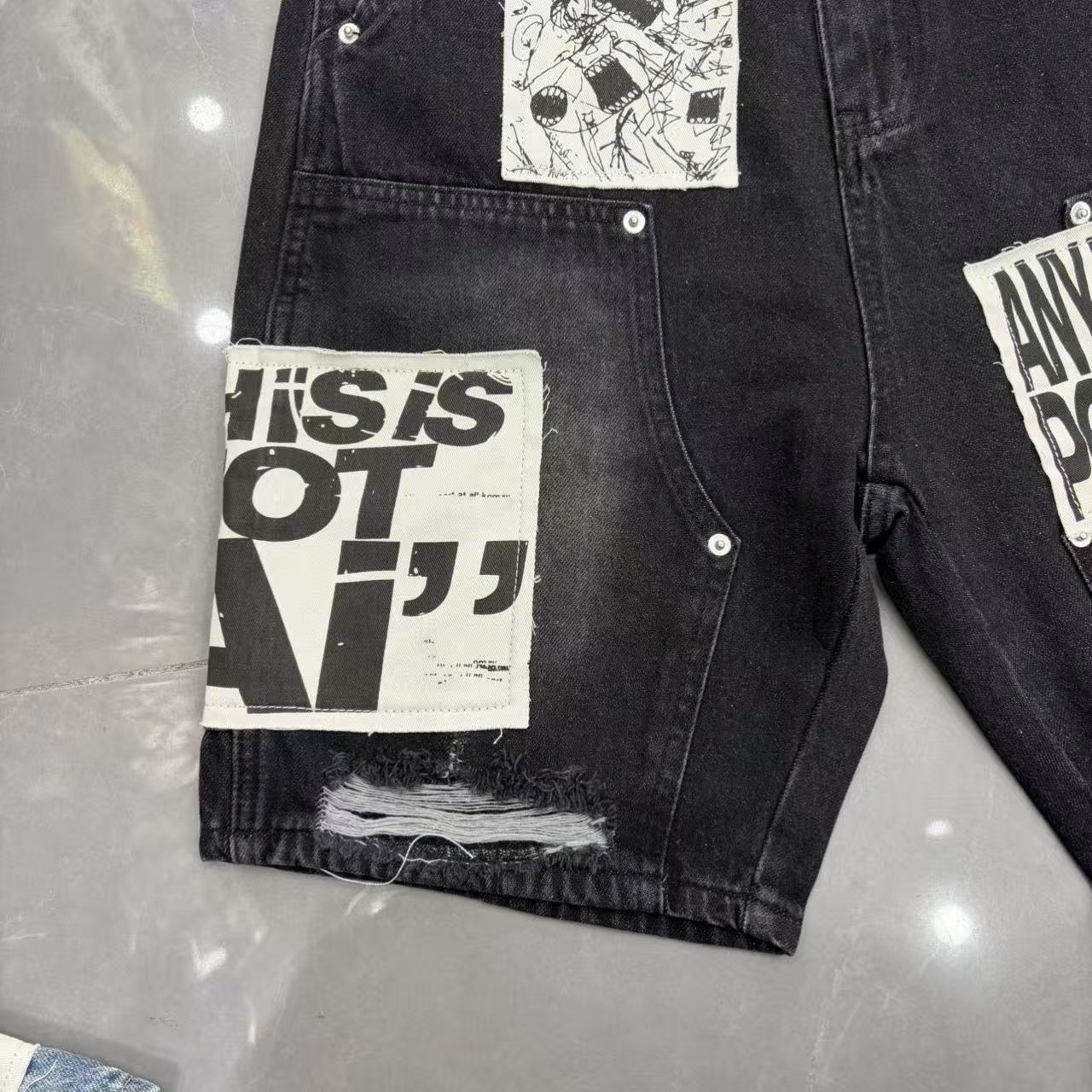 Unisex patchwork distressed denim Bermuda shorts detail 3