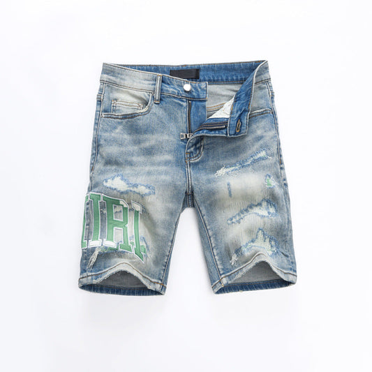 Men's light blue denim mid-length shorts with embroidered patches and elastic waistband for summer fashion